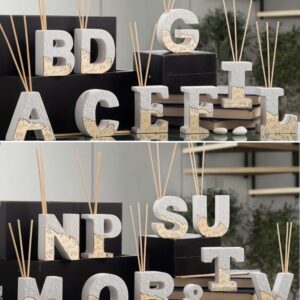 Profumatore in marmoresina a forma di lettera decoro oro